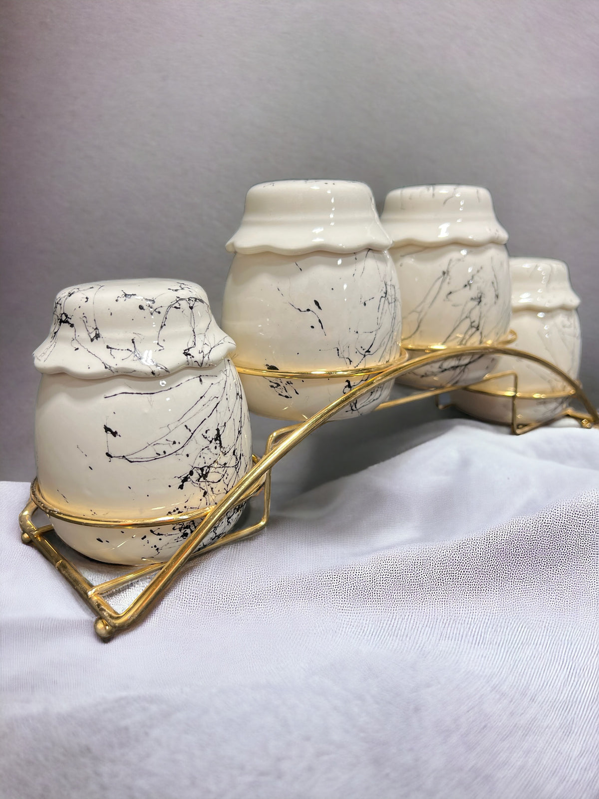 Porcelain Spice Rack with a Gold Metal Display